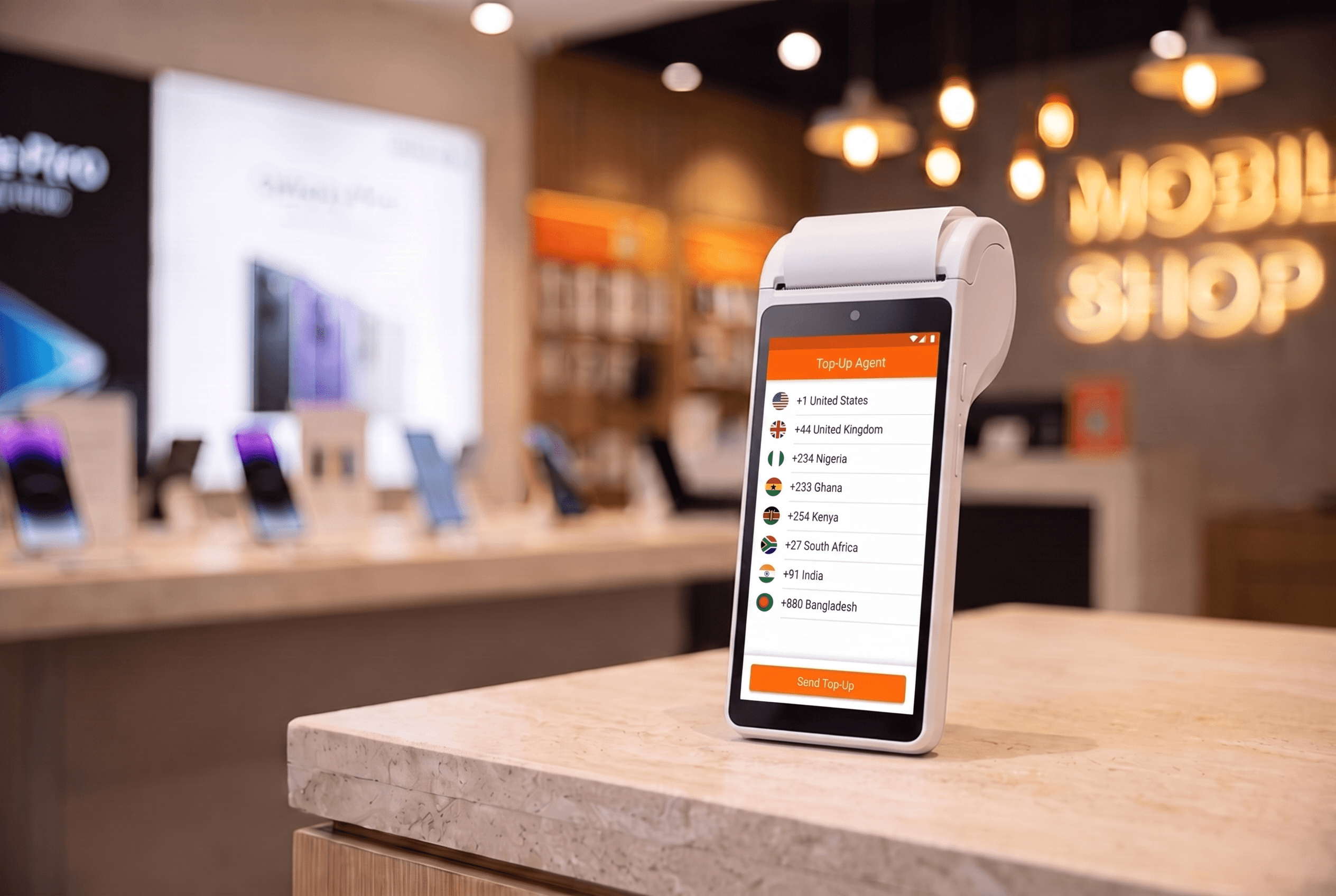 Handheld smart terminal running a branded top-up app on a shop counter